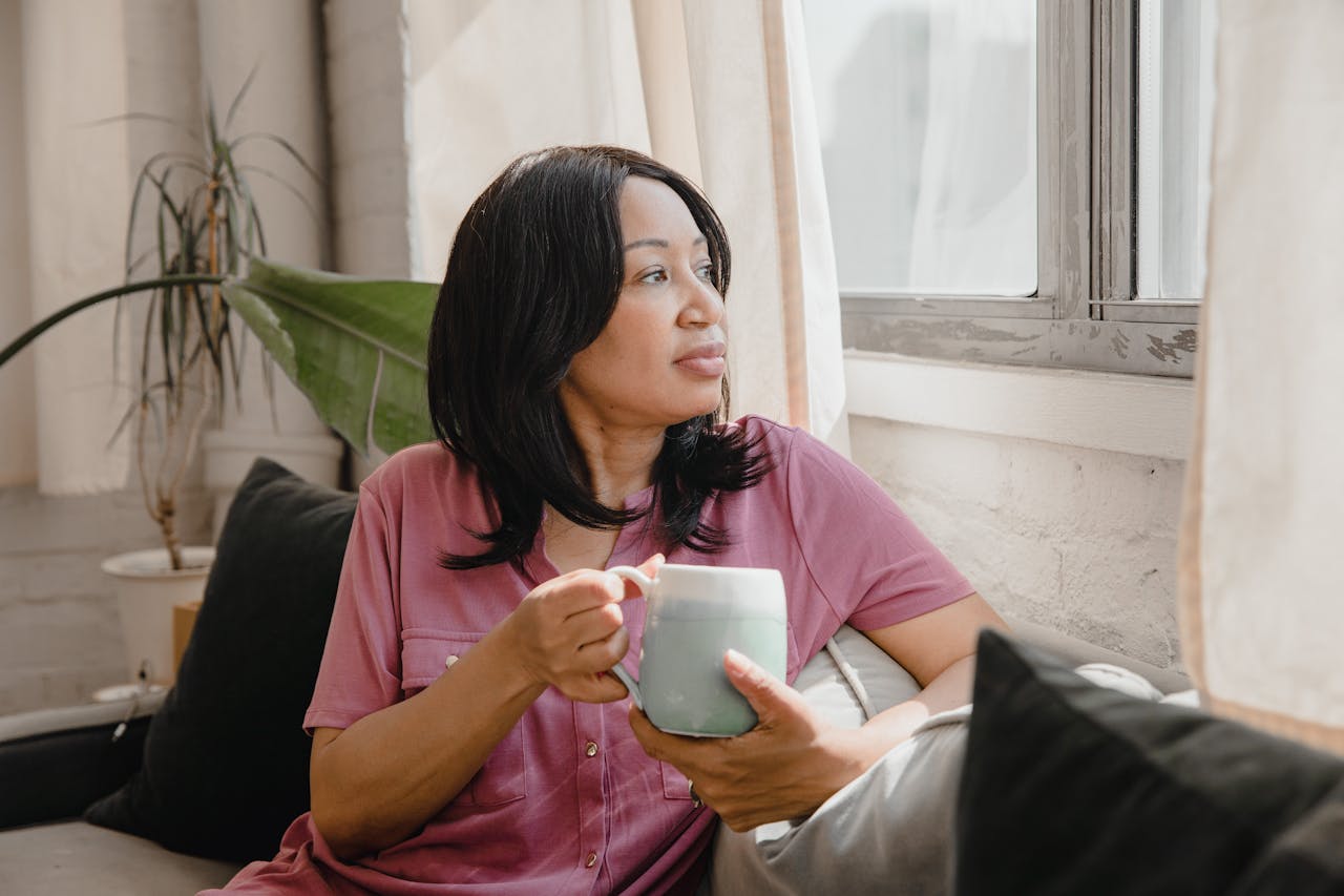 Photo of a woman with a coffee mug